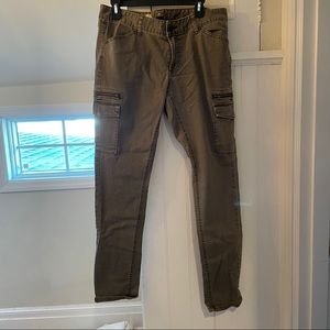 Olive green zip skinny jeans